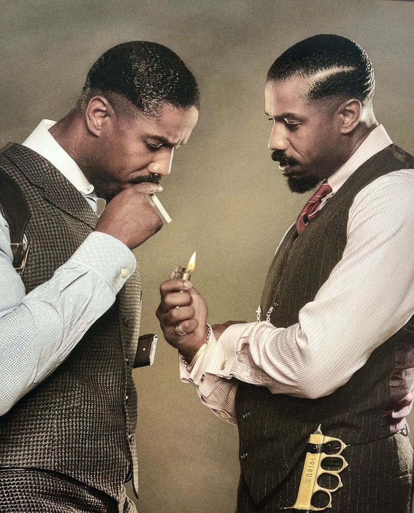 Vintage Vest Look Michael B. Jordan in a vintage three-piece suit lighting a cigarette for another man, both dressed in classic vests with slicked-back hair