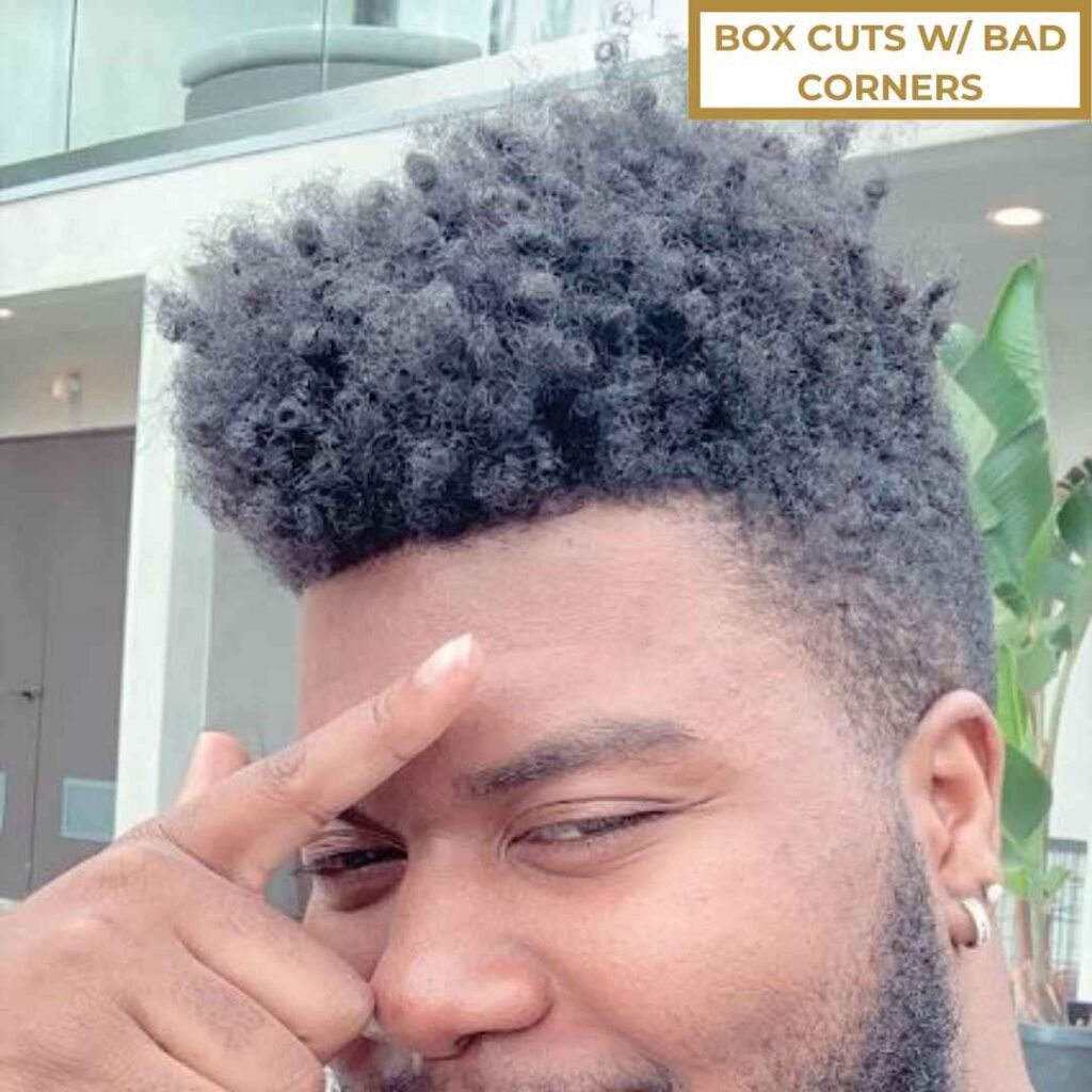 Box Cut with Bad Corners for Receding Hairlines Black man with box cut hairstyle, uneven corners visible, receding hairline example.