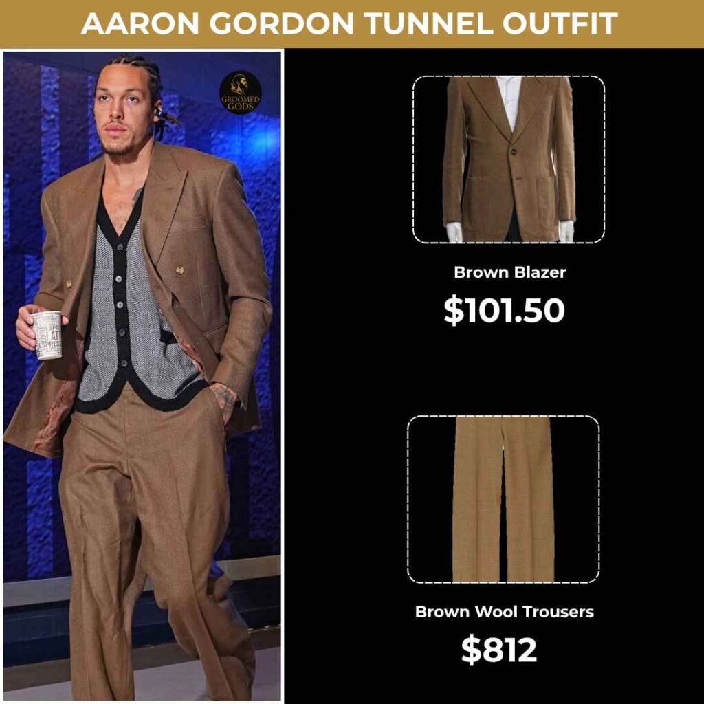 Aaron Gordon Tunnel Fit with Brown Suit ($913.50) Aaron Gordon wearing a brown blazer and brown wool trousers with a gray contrast vest; holding a cup while walking through the tunnel.