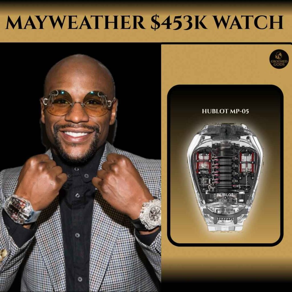 Floyd Mayweather smiling in a checkered suit, showing off his wristwatches next to the $453K Hublot MP-05 LaFerrari watch with a transparent case and red detailing on a gold background.