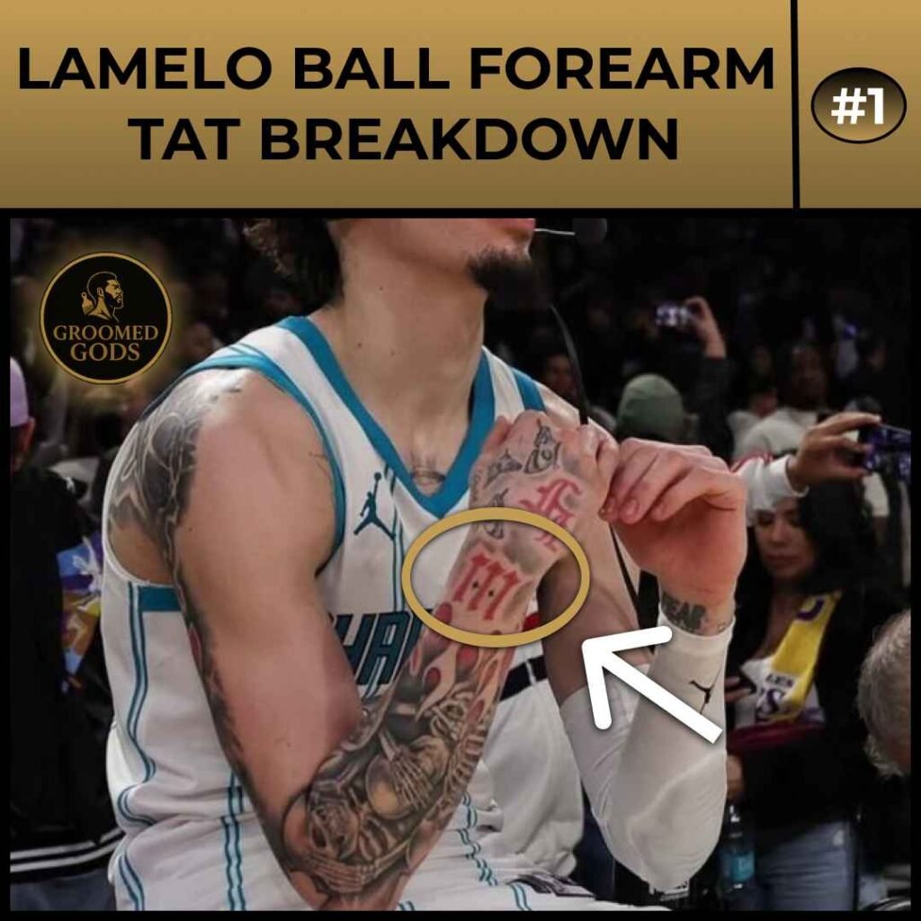 LaMelo Ball forearm tattoo featuring red script lettering layered over a black-and-grey sleeve design.